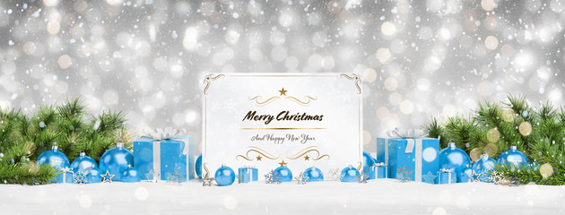 Christmas card laying on blue baubles and gift 3D rendering