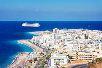 View of Aegean coast of City of Rhodes and cruise ship (Rhodes, Greece).