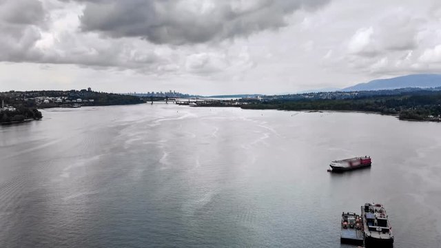 Aerial hyperlapse over Burrard Inlet with a view of downtown Vancouver.