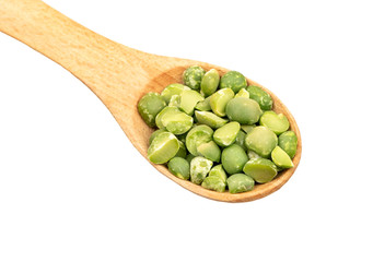 Dry green peas in spoon