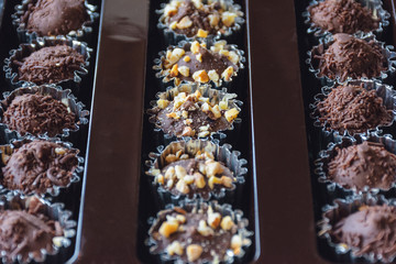 Chocolate truffle sweets with nuts