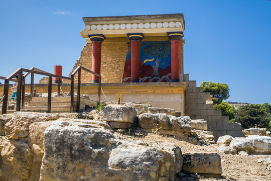 Red columns of the Knossos palace. Fragment of the ruins of the Knossos palace. Architecture on Crete, Greece.