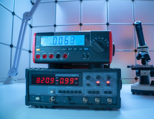 Electronic measuring instrument. Function generator and  Multimeter Instrument for measuring voltage