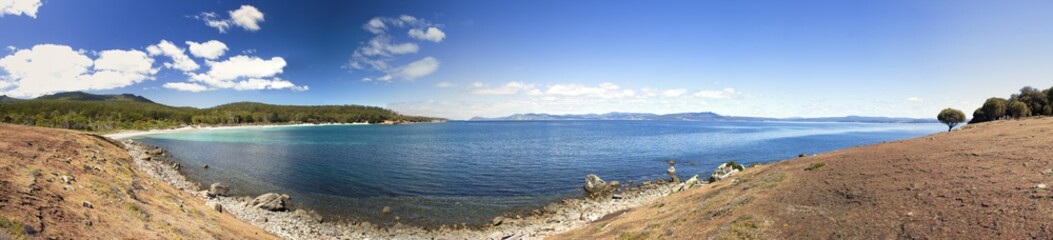 Fototapeta premium Panoramic landscape with the beach in Maria Island in Tasmania, national reservation in Australia, beautiful seaside and coastal scenery