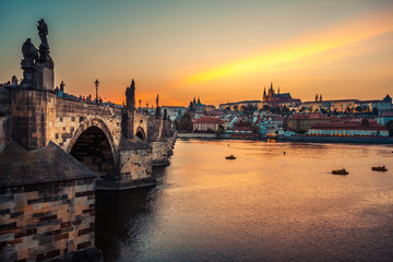 Fototapeta na wymiar Prague castle and Charles bridge at sunset, Czech republic