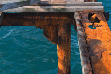 disassembled rusty metal pier. old metal supports. Black Sea
