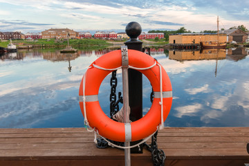 Lifebuoy on the monastery embankment of the Big Solovetsky Island