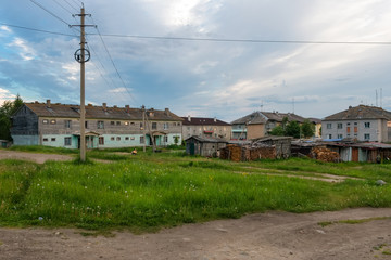 ISLAND SOLOVKI, RUSSIA - JUNE 26, 2018: View of houses in the village of Solovki on a polar summer day, at sunset.  Arkhangelsk region, White Sea © Konstantin