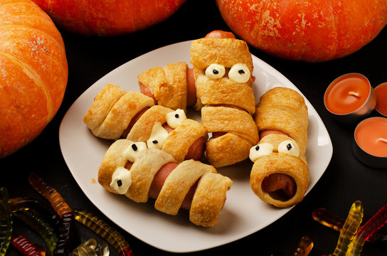Scary sausage mummies in dough