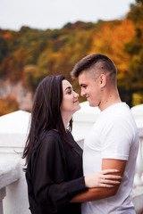 Fototapeta premium The girl and the guy look at each other for a walk
