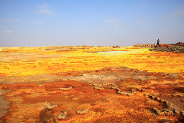 Out-this-planet view to Dallol volcano crater at Danakil Depression and sulfur, salt, potassium, calcium and ferrum mineral fields in hottest place on Earth