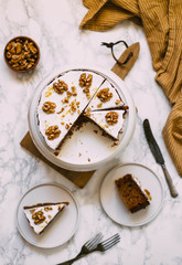 Carrot Cake with Cream Cheese Icing and walnut. Vegan and gluten free concept