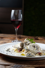 Baked veal with mushroom and sauce served with couscous