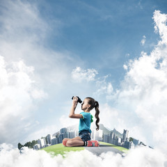 Concept of careless happy childhood with girl looking in future