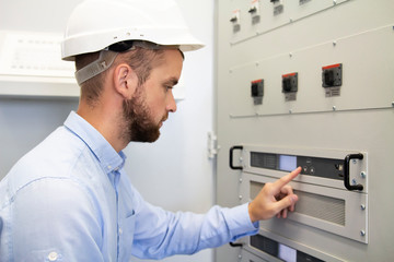 Electrician service man configurates of electrical controller