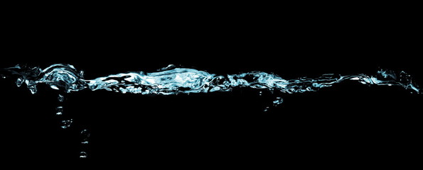 water splash with drops isolated on black background