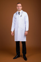 Full length shot of man doctor wearing eyeglasses