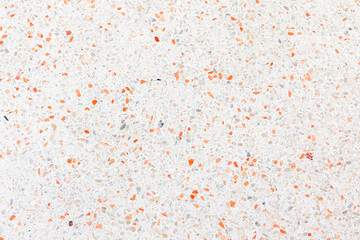 Naklejka premium podłogi z lastryko z pomarańczową skałą Małe lub marmurowe stare. polerowane kamienne ściany piękne tekstury na tle z miejsca na kopię dodać tekst