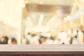 Empty wooden table top and Blur image background with space display montage for product.