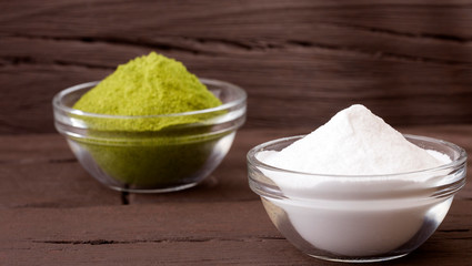 Natural sweetener in powder from stevia plant - Stevia rebaudiana. Top view