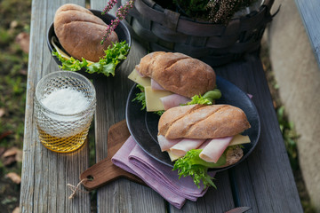 Ciabatta baguette sandwiches with ham, cheese and lettuce