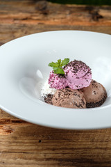 Three kind of ice cream balls with mint