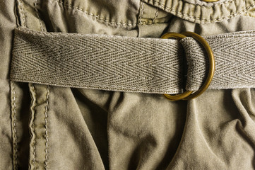 clothing items washed cotton fabric texture with seams, clasps, buttons and rivets