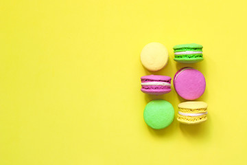 Macaroon on a colored background top view, copyspace