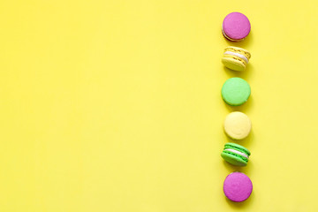 Macaroon on a colored background top view, copyspace