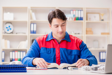 Worker in uniform working on project