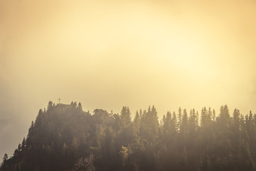 Top of a mountain in the European Alps in Austria in morning sunlight, nature background concept