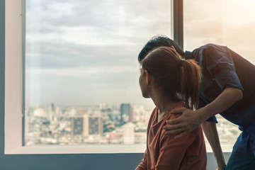 PTSD Mental health concept, Psychologist sitting and touch young depressed asian woman for...
