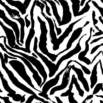 Brush painted zebra seamless pattern. Black and white stripes grunge background.