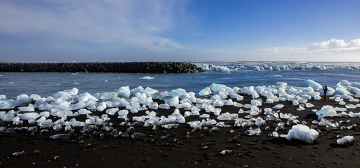 Diamond Beach Iceland. Ice on the black beach near Jokulsarlon glacier lagoon. Glacier icebergs in Iceland. Icelandic Nature.