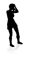 A woman singer pop, country music, rock star or even hiphop rapper artist vocalist singing in silhouette