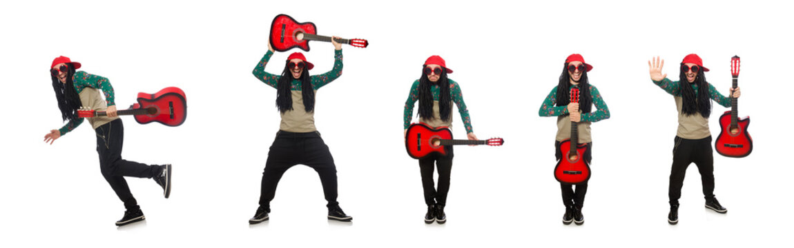 Man with guitar in musical concept on white