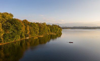 Canue in lake, Autumn colors