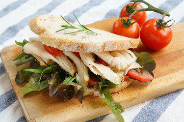 Grilled chicken sandwich with lettuce and tomato