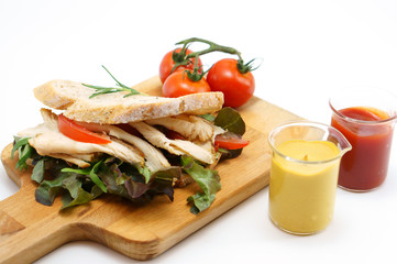 Grilled chicken sandwich with lettuce and tomato