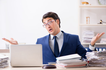 Busy man complaining about his workload