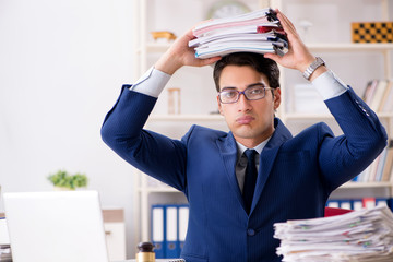 Busy man complaining about his workload