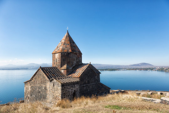 Scenic view of an old Sevanavank church in Sevan, on sunny day . Armenia