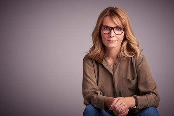 Middle aged woman studio portrait