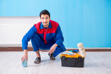 Young man doing home renovation 