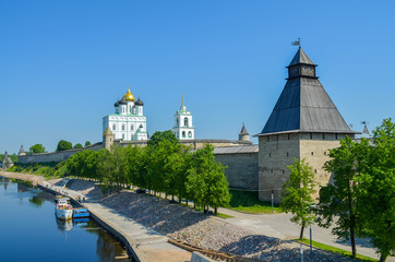 Russia. Pskov. Embankment of the Great river at the walls of the Pskov Kremlin. View from Olginsky bridge
