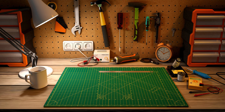 Wooden workbench at workshop. Lot of different tools for diy and repair works. 
