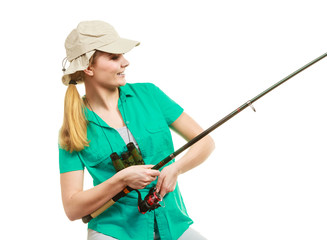 Woman with fishing rod, spinning equipment