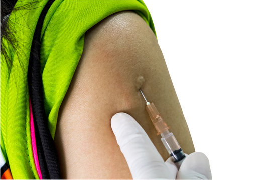 Hand of doctor inject vaccine solution in intradermal isolated on white.Saved with clipping path.