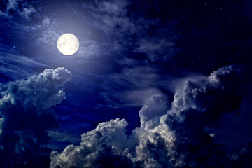 Naklejka na ściany i meble Full moon and stars in cumulus clouds