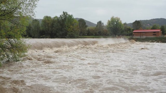 The Serio river swollen after heavy rains. Province of Bergamo, northern Italy
